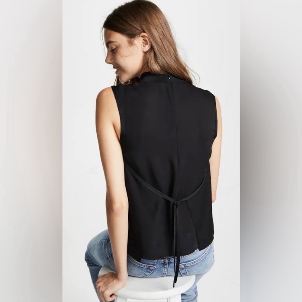Vince top 100% silk with ribbed trim. Size S.